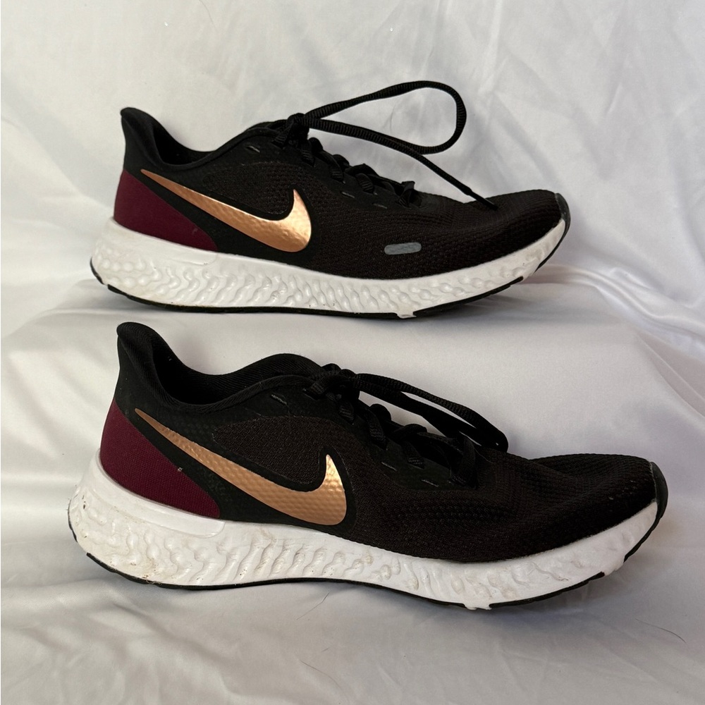 Nike Revolution Black and Gold Athletic Sneakers